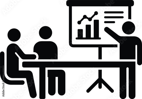 A group of people sitting at a table, engaging in a discussion.