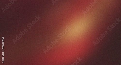 Abstract image displaying a warm, inviting light spot with red and gold tones on a dark, grainy background, creating a cozy ambiance.