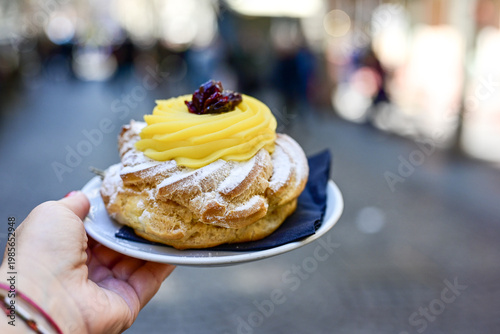 Zeppola.Traditional Italian dessert, pastries iin Naples , Italy.Typical Neapolitan pastry product