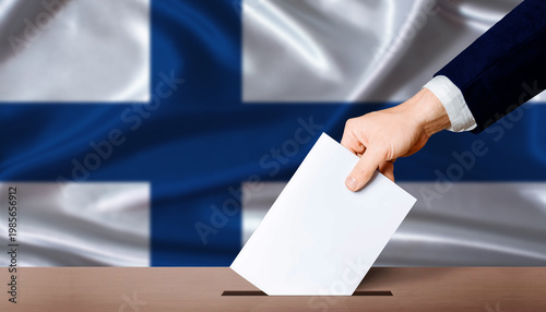 Finland Parliamentary vote 2026. Hand placing a ballot in ballot box with the Finnish flag in the background
