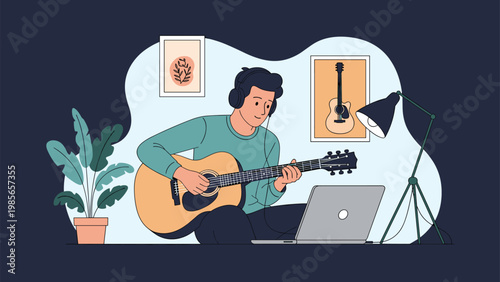 Young man wearing headphones and learning to play the acoustic guitar while following a lesson on a laptop.