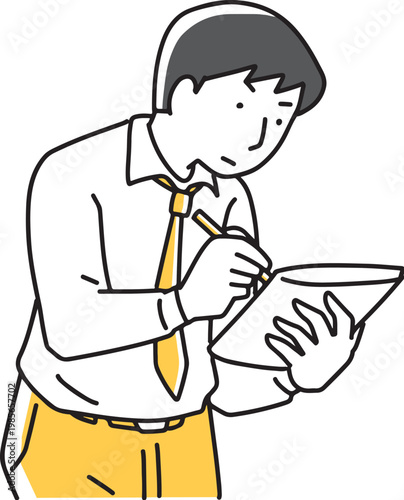 メモを取っている男性社員