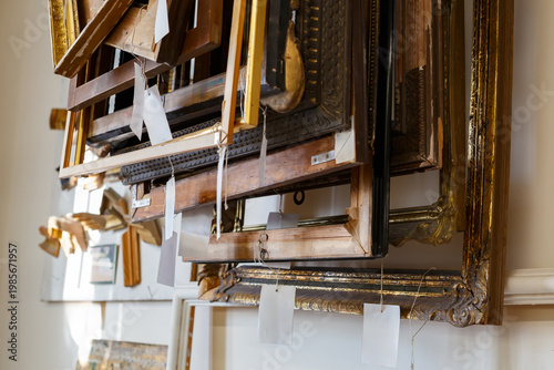 Collection of Old Picture Frames in a Storage Space During the Afternoon