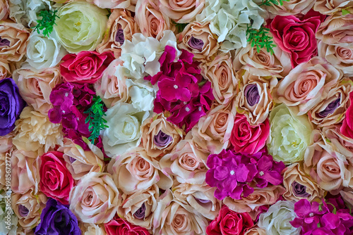 Colorful artificial flower wall background for events