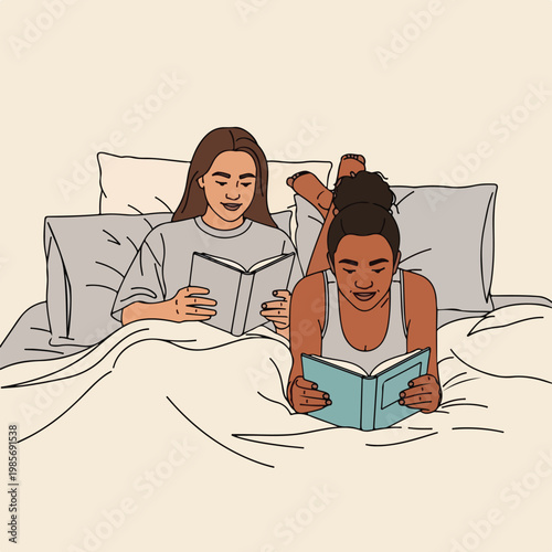 Two women lying in bed together, each reading a separate book in a quiet moment