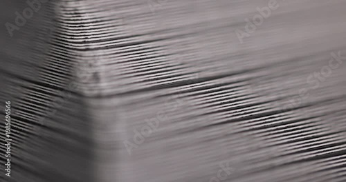 cardboard cards in a pack, macro ends of a stack of cardboard cards with smooth lines and thin gaps in daylight with a clear contour and an organic surface of paper material.
