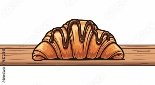 A golden brown croissant drizzled with dark chocolate sits on a wooden plank