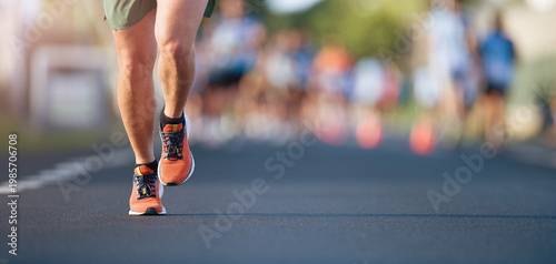 Marathon running race, people feet on city road, runners run urban marathon in the the city