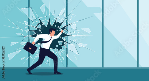 Determined businessman running and breaking through a large glass window representing overcoming barriers and future success.