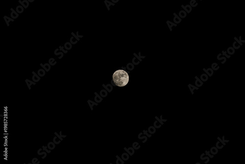 Fényképezés Full Moon Centered in Black Night Sky with Minimal Composition