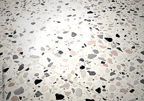 A terrazzo surface with black and pink chips