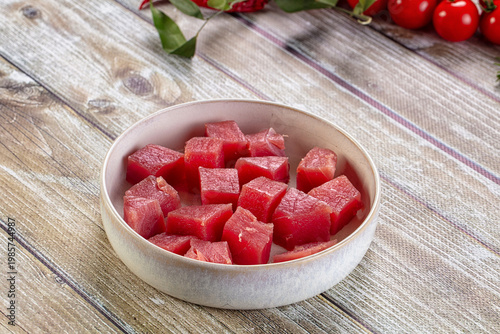 Raw tuna fish cubes heap