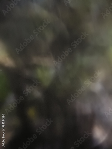 Abstract blur background texture, soft dark shadow gradient pattern, dreamy mood, subtle light bokeh effect