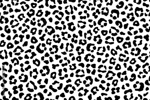 Fashion leopard seamless pattern, isolated black spots. Vector