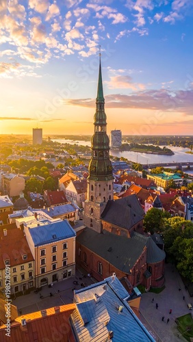 Aerial view of a city with a tall church steeple