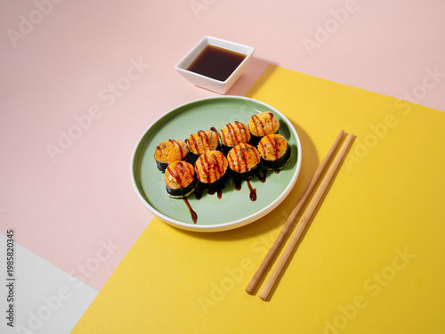 Crispy fried sushi with vibrant spices and savory soy dip