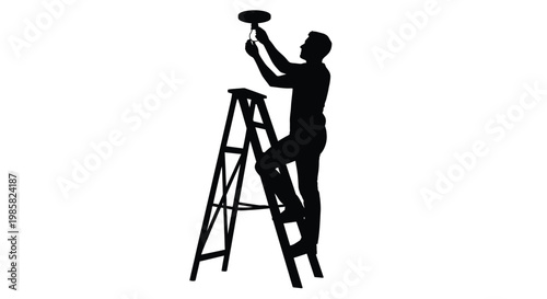 Silhouette of a man on a ladder installing or repairing a ceiling light fixture