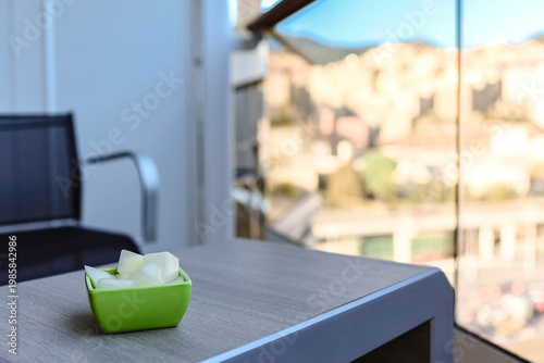 Cruise ship balcony with simple breakfast and modern deck architecture soft daylight and relaxed travel atmosphere at sea