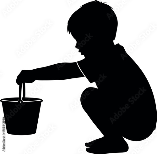 Black vector silhouette illustration of a young boy crouching down playing and holding a small bucket on a white background.