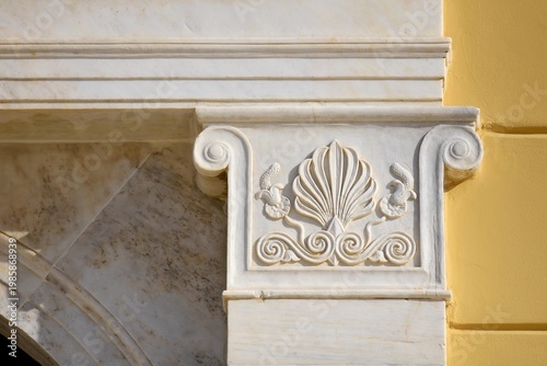 Fotografie White marble sculpted frieze depicting the Anthemion an ancient motif and architectural ornament found in Kalamata, Peloponnese Greece