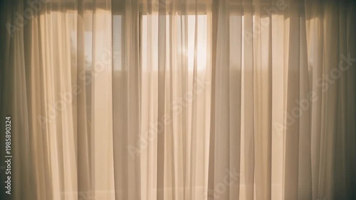 Cinematic close detail of white curtain gently moving in warm sunlight, minimal interior background,