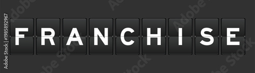 Black color analog flip board with word franchise on gray background