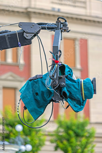 Broadcast Camera With Weather Cover at Jib Crane Live Event in City
