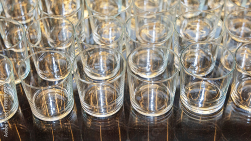 Many Clean Empty Drinking Glasses at Buffet Table