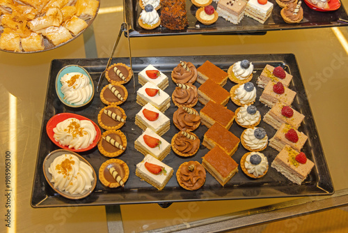 Served Cakes Tarts Sweets at Black Tray Dessert Buffet Table