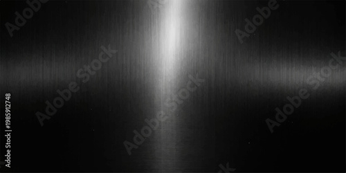 Shiny brushed silver metallic texture with a centered spotlight reflecting on a dark gray polished stainless steel plate surface for a sleek industrial aluminum background wallpaper design