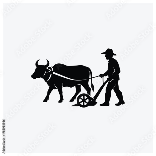 Silhouette of a farmer plowing a field with an ox