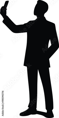 Silhouette of a businessman taking a selfie with his smartphone isolated on white background representing modern communication and technology