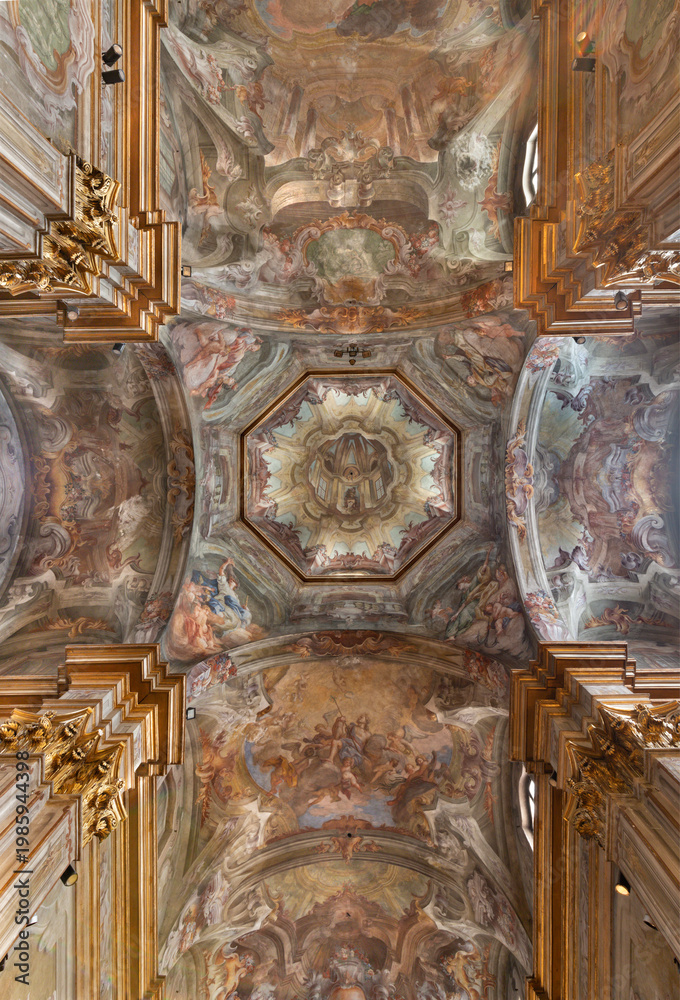 Fototapeta premium VERCELLI, ITALY - JANUARY 16, 2026: The baroque fresco in the cupola and ceiling Glory of St. Cristophorus in the church Chiesa di San Cristoforo by Francesco Maria Bianchi from 18. cent.