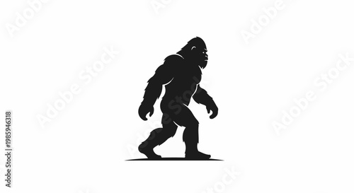 Black silhouette of a furry, bipedal ape-like creature walking
