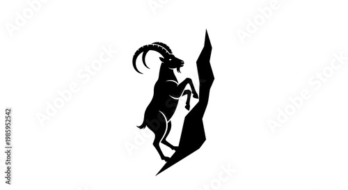 Silhouette of an Ibex climbing a steep rock face, majestic mountain animal