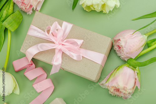 Happy Mothers Day concept. Gift boxes wrapped in craft paper and ribbons, handmade crocheted hearts