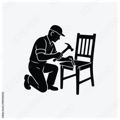 Silhouette of a craftsman or carpenter working with tools at a table.