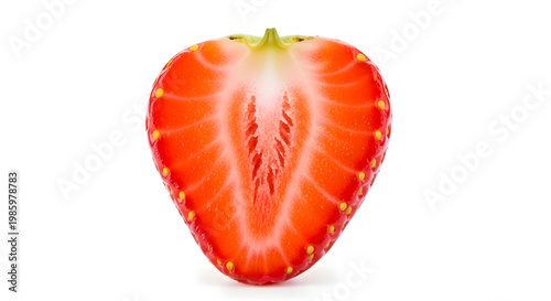 A sliced strawberry with seeds on a white background
