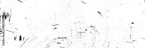 Rough monochrome scratched surface on vintage background used to create a grunge backdrop in an art project or photo shoot.