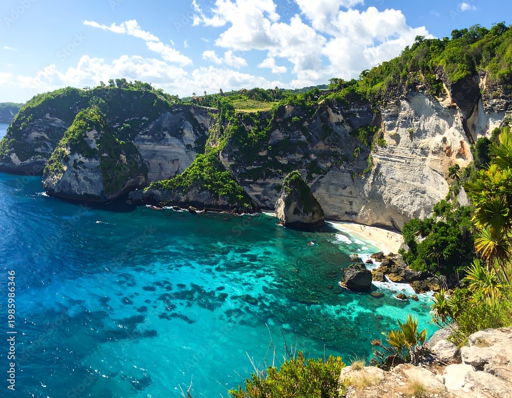 Naklejka premium A scenic coastal landscape with turquoise waters and lush greenery (1)