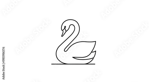 A serene swan swims peacefully on calm water in a natural setting.