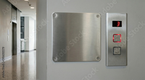 Elevator control panel showing floor three in modern building hallway  