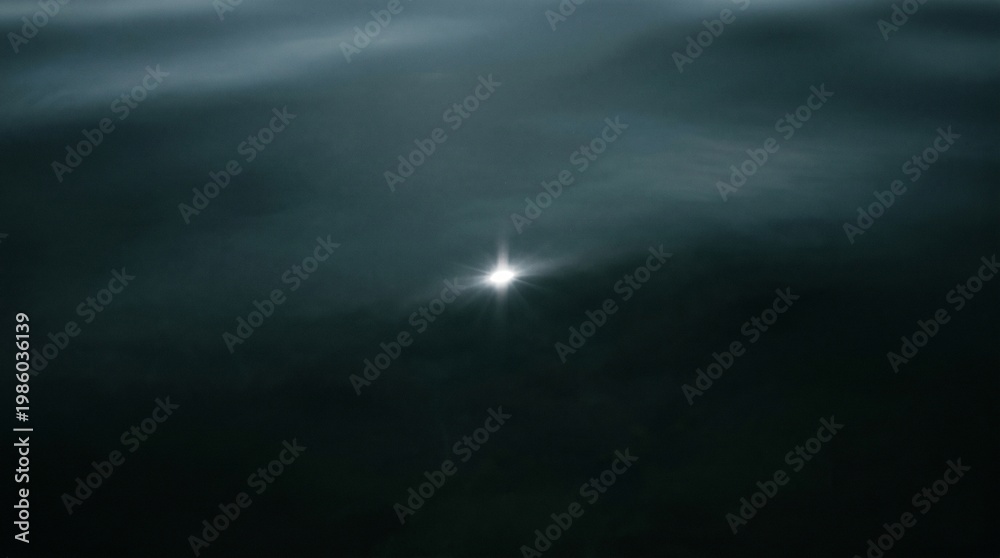 Fototapeta premium Single sun glint sparkling on dark deep water surface