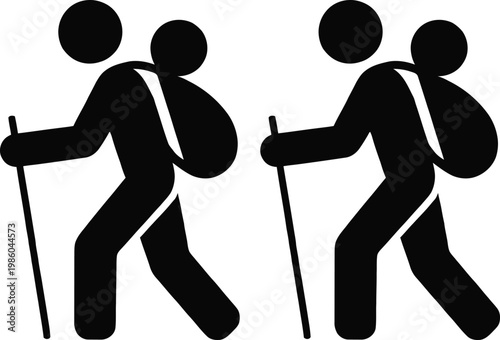 Two hikers using trekking poles on a journey together through nature.