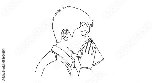 Young man sipping drink from a cup while sitting quietly  