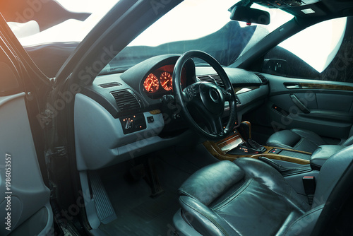 car inside gray seats red dashboard night photography in the dark