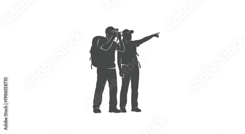 Two hikers with camera and pointing hand exploring outdoors silhouette