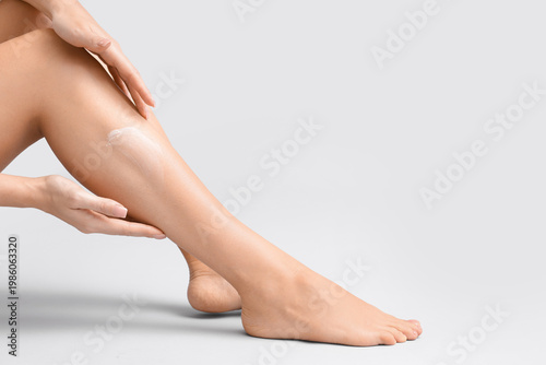 Woman with silky legs on li...
