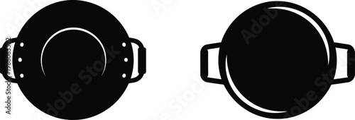 Two black frying pans with handles side by side on transparent background