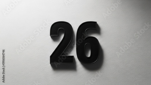 Black Number 26 Floating on Textured White Background